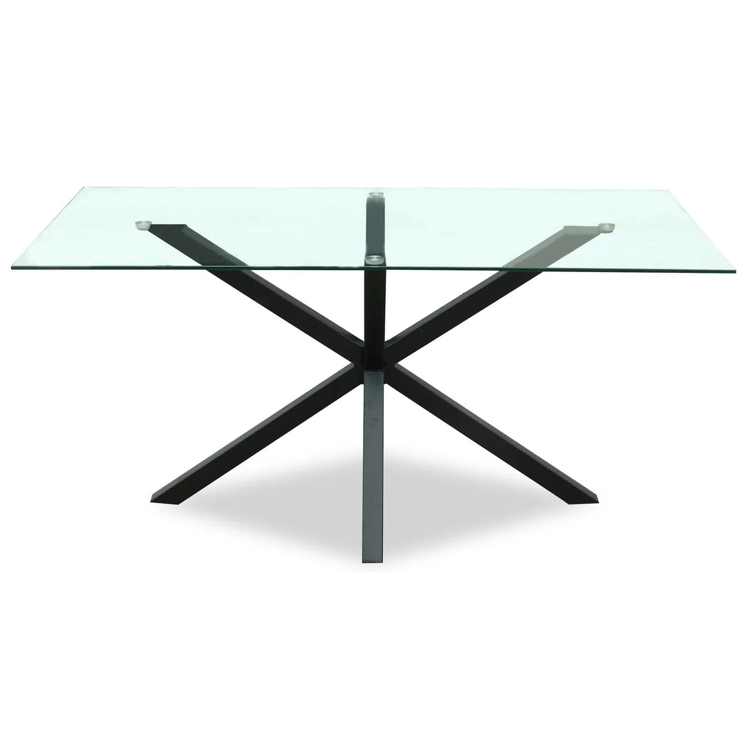 Glass dining table with black metal legs on a white background
