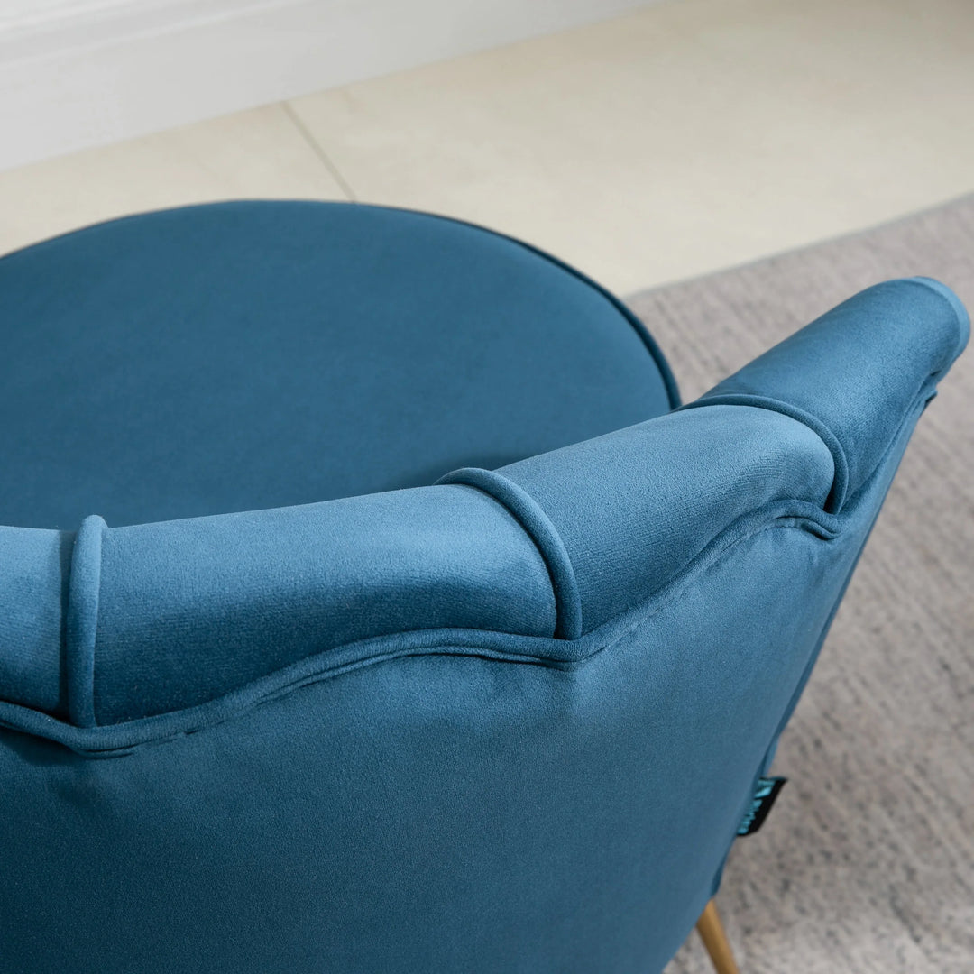 Close-up of a blue armchair with a blurred background