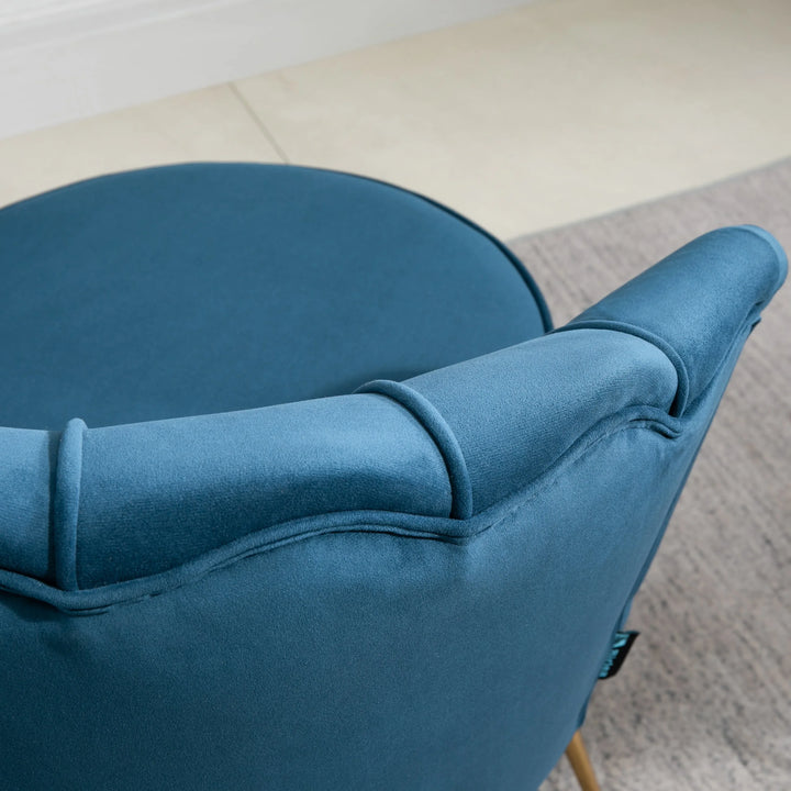 Close-up of a blue armchair with a blurred background