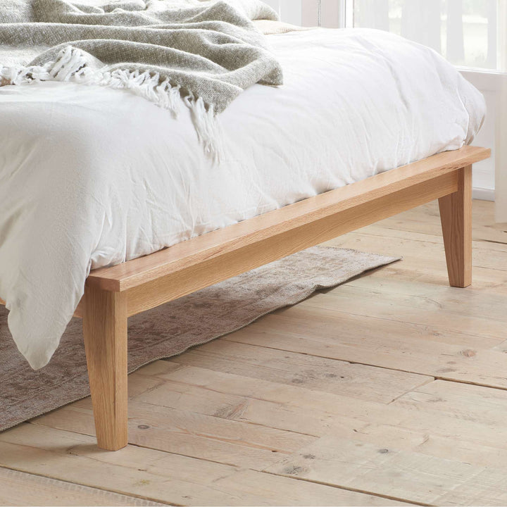 Astrid Rattan Bed with Wingback Headboard and Curved Weave Design