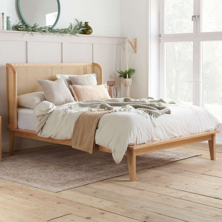 Astrid Rattan Bed with Wingback Headboard and Curved Weave Design
