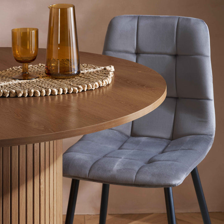 Axel Round Fluted Dining Table with Sculpted Pedestal Base and Textured Fluted Design