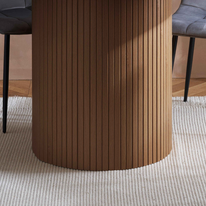 Axel Round Fluted Dining Table with Sculpted Pedestal Base and Textured Fluted Design