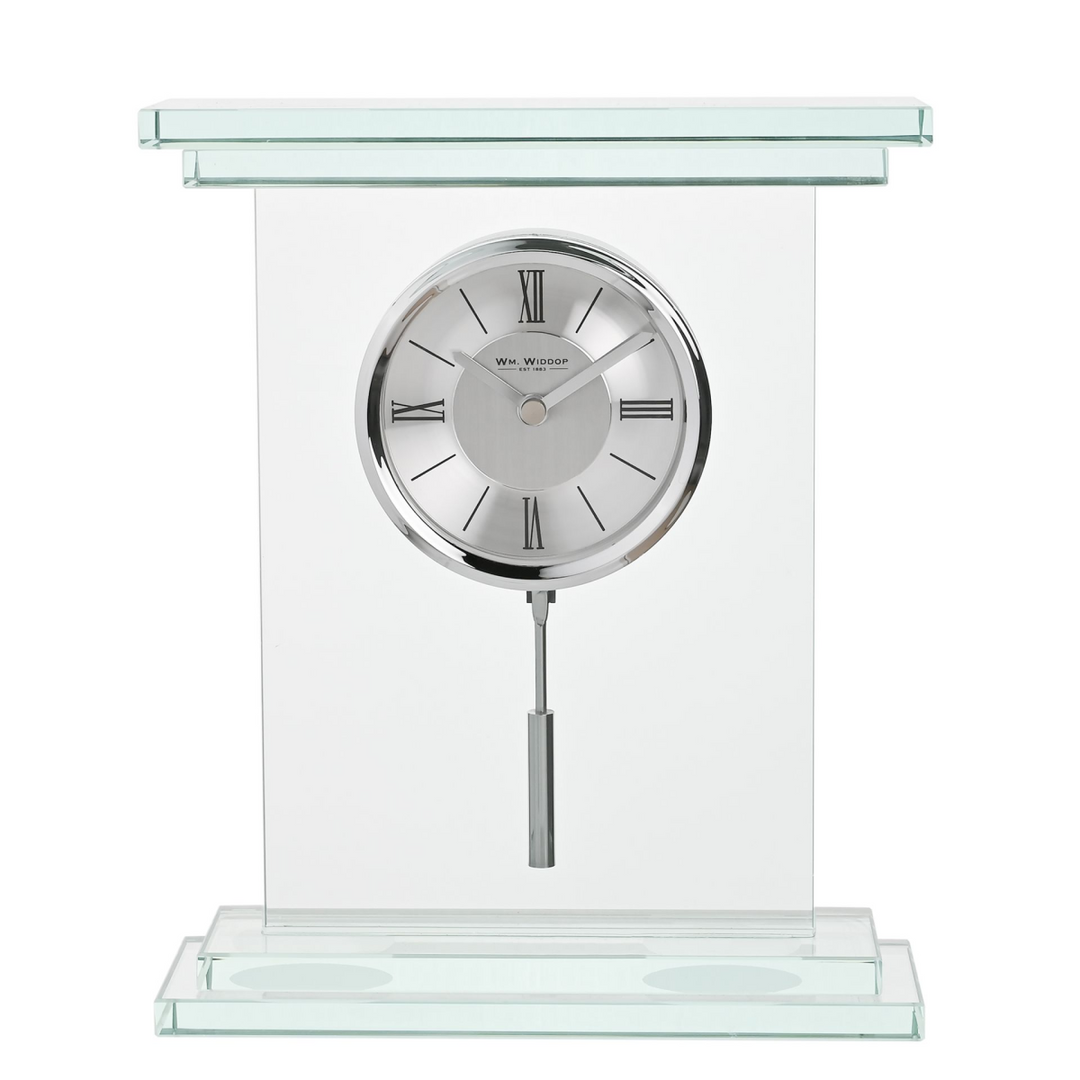 Glass clock with silver face and stand on a white background