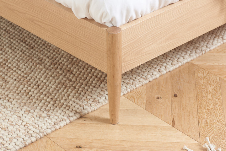 Jesper Oak Bed with Distinctive Spindled Headboard for Stylish Bedrooms