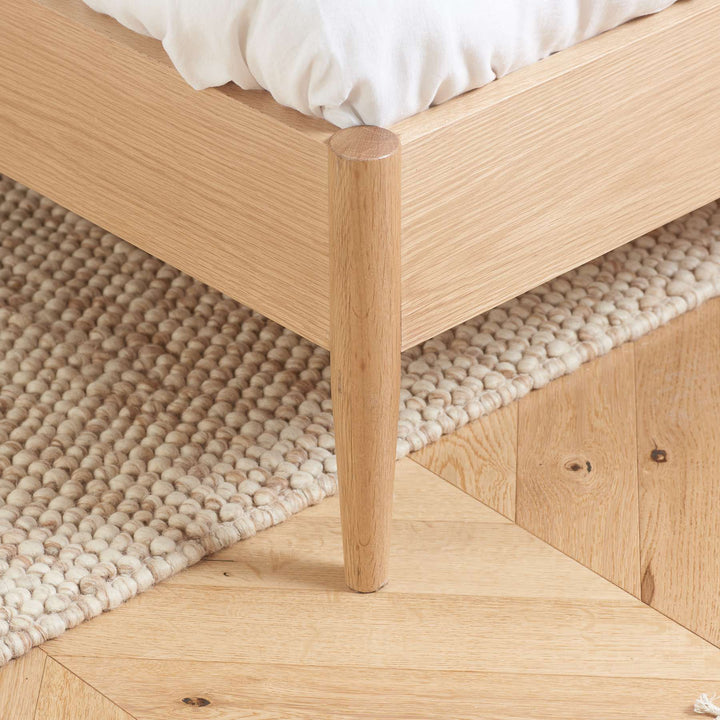 Jesper Oak Bed with Distinctive Spindled Headboard for Stylish Bedrooms