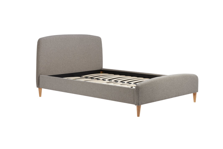 Quebec Upholstered Bed Frame with Gentle Curves and Soft Grey Fabric