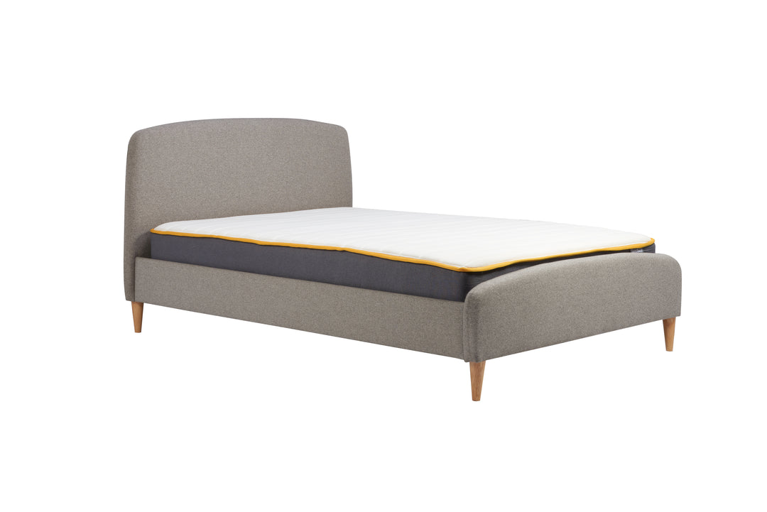 Quebec Upholstered Bed Frame with Gentle Curves and Soft Grey Fabric