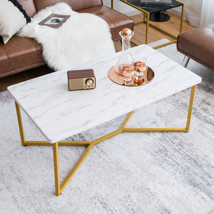 Modern Coffee Table with Faux Marble Tabletop and Golden Y shaped Legs - TidySpaces